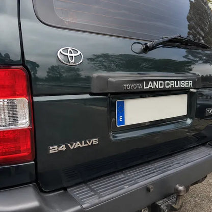 Détail du lettrage du monogramme 24 VALVE Land Cruiser 80